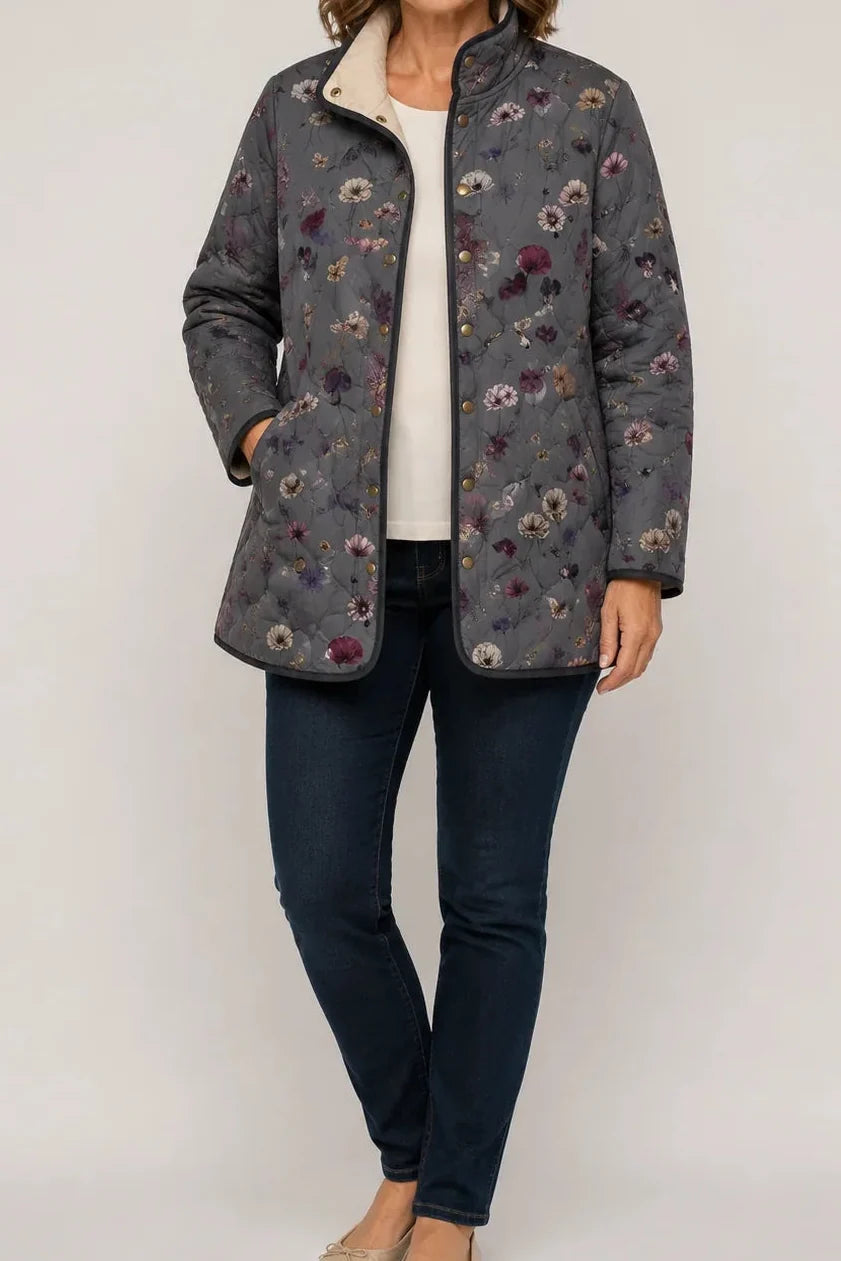 Wearbella gray quilted jacket with small multicolor wildflower print and snap front.