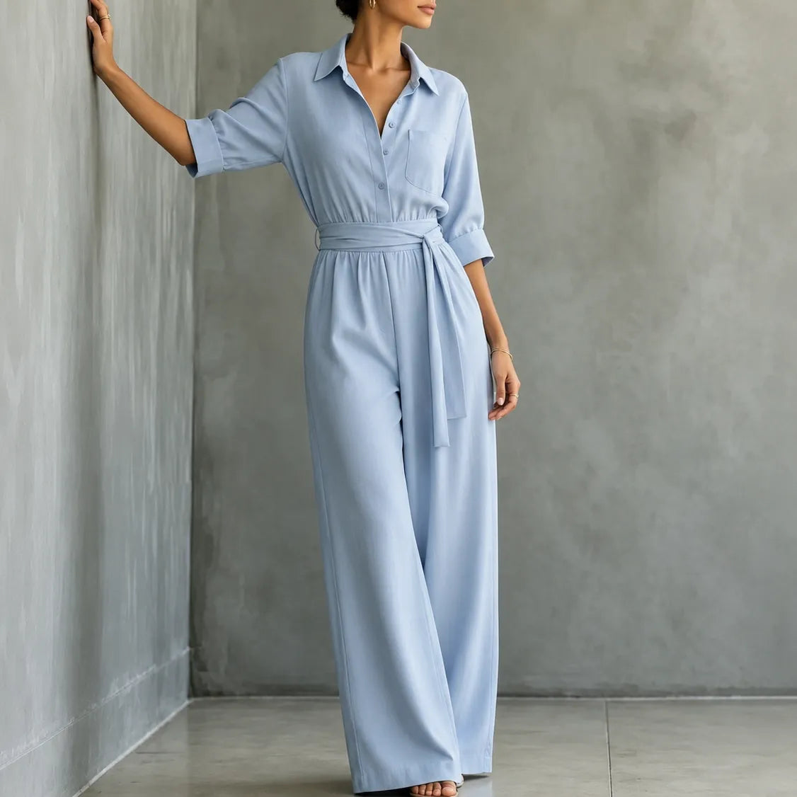 Chambray blue belted shirt jumpsuit with collar, button front, wide legs