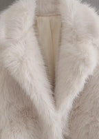 White plush teddy coat detail with stand-up collar and open front lining
